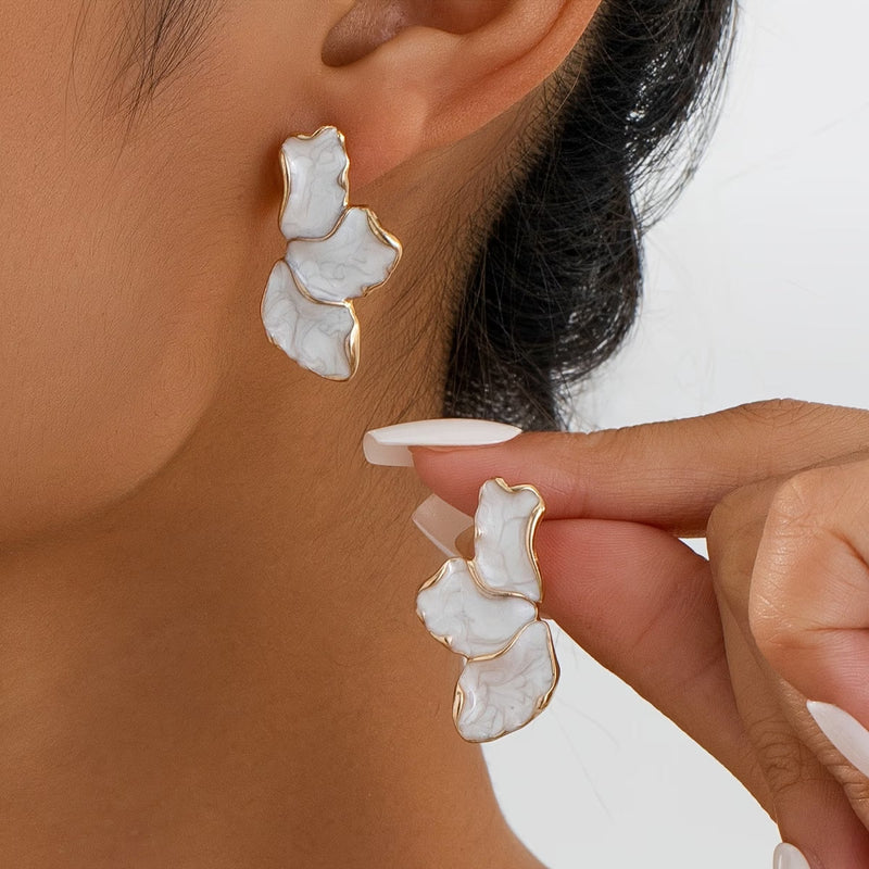 Milagros | Pendientes de perlas en pétalos
